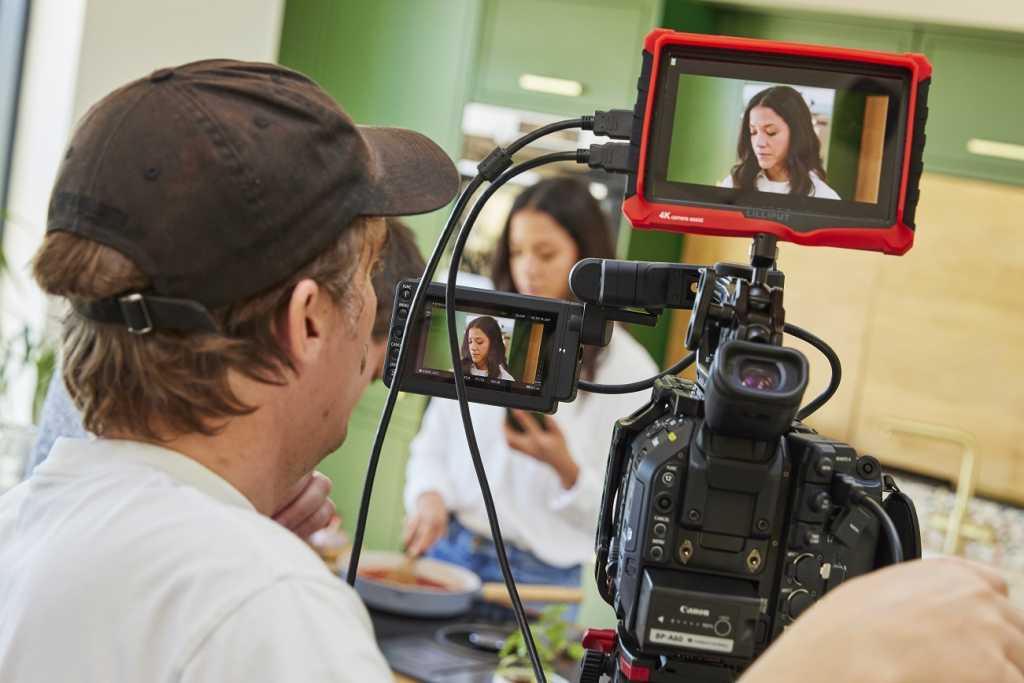 Looking onto the filming set behind the camera