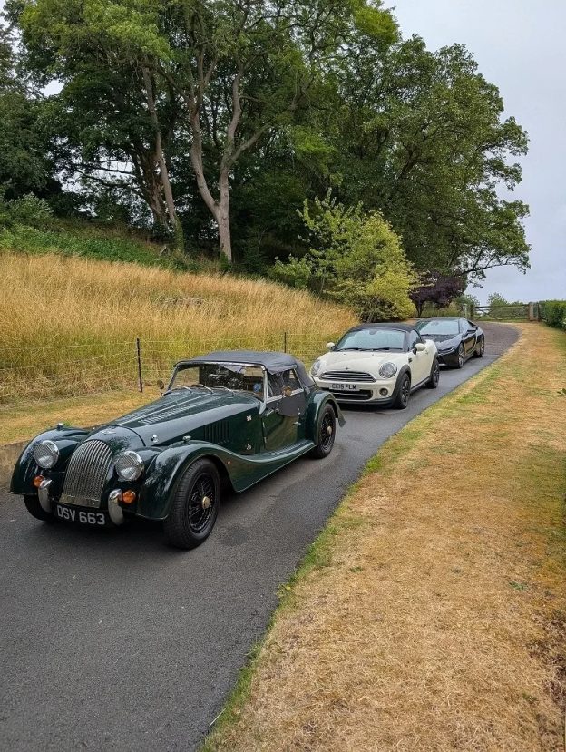 Line of old cars on a road for Turo