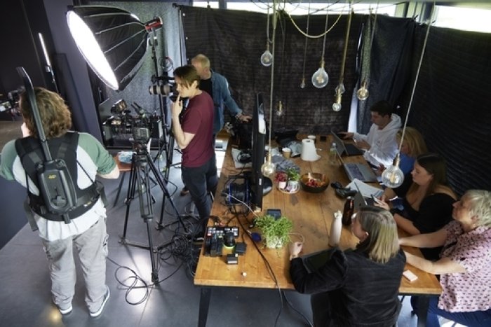 Behind the scenes shot of a filming set up